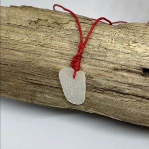 White Sea glass pendant with red hemp chain